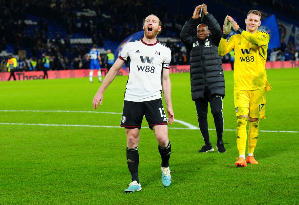 Tim Ream celebrates at full-time against Chelsea