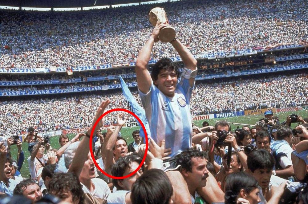 Duncan Coales, circled, finds himself in shot as Diego Maradona lifts the World Cup