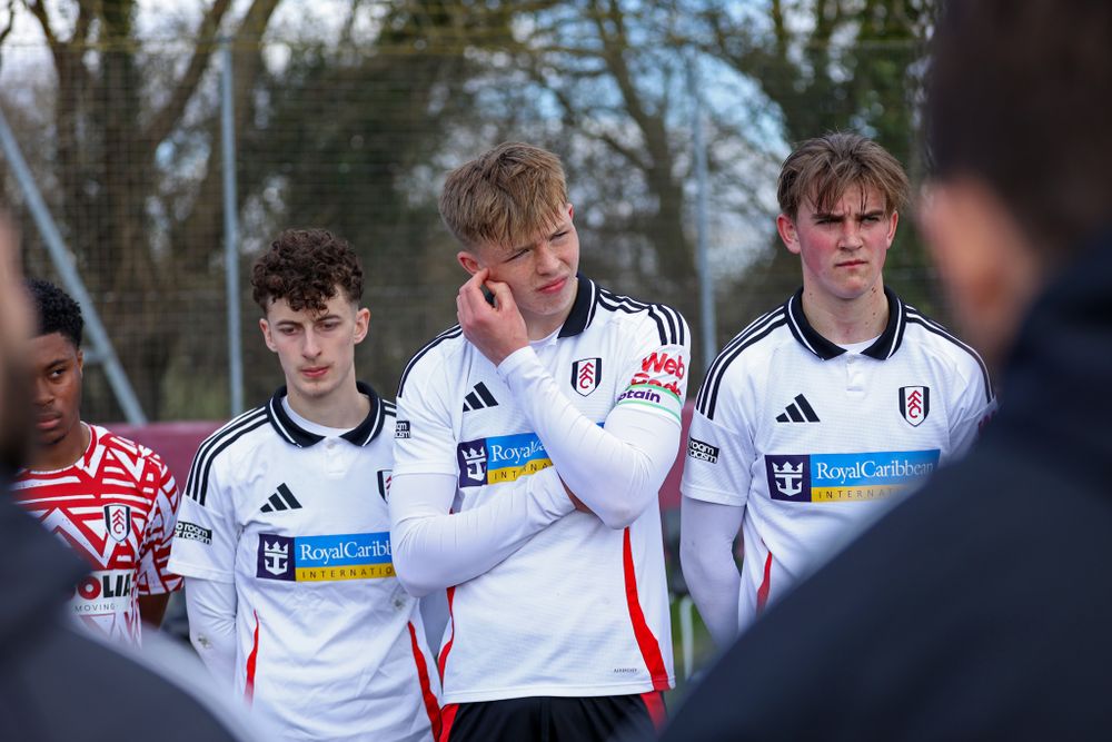 Fulham U18s defender Logan Cooke stands in between Tom Wingate and Archie Taylor Fulham U18s defender Logan Cooke stands in between Tom Wingate and Archie Taylor