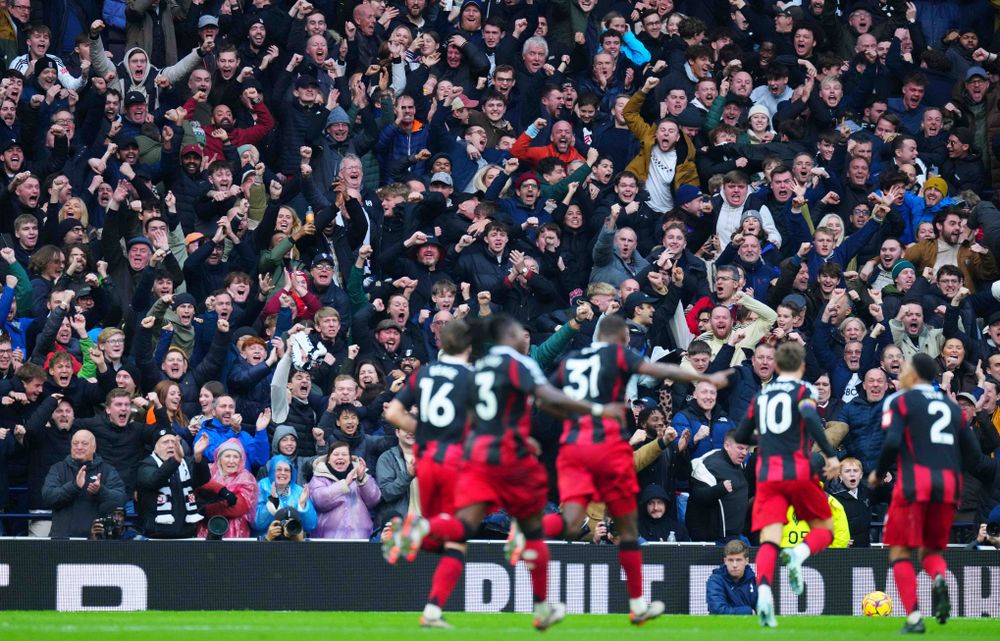 Tom Cairney celebrates his goal with the Fulham fans Tom Cairney celebrates his goal with the Fulham fans