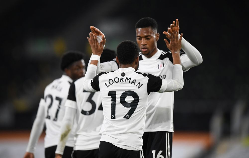 Tosin celebrates with the goalscorer Lookman