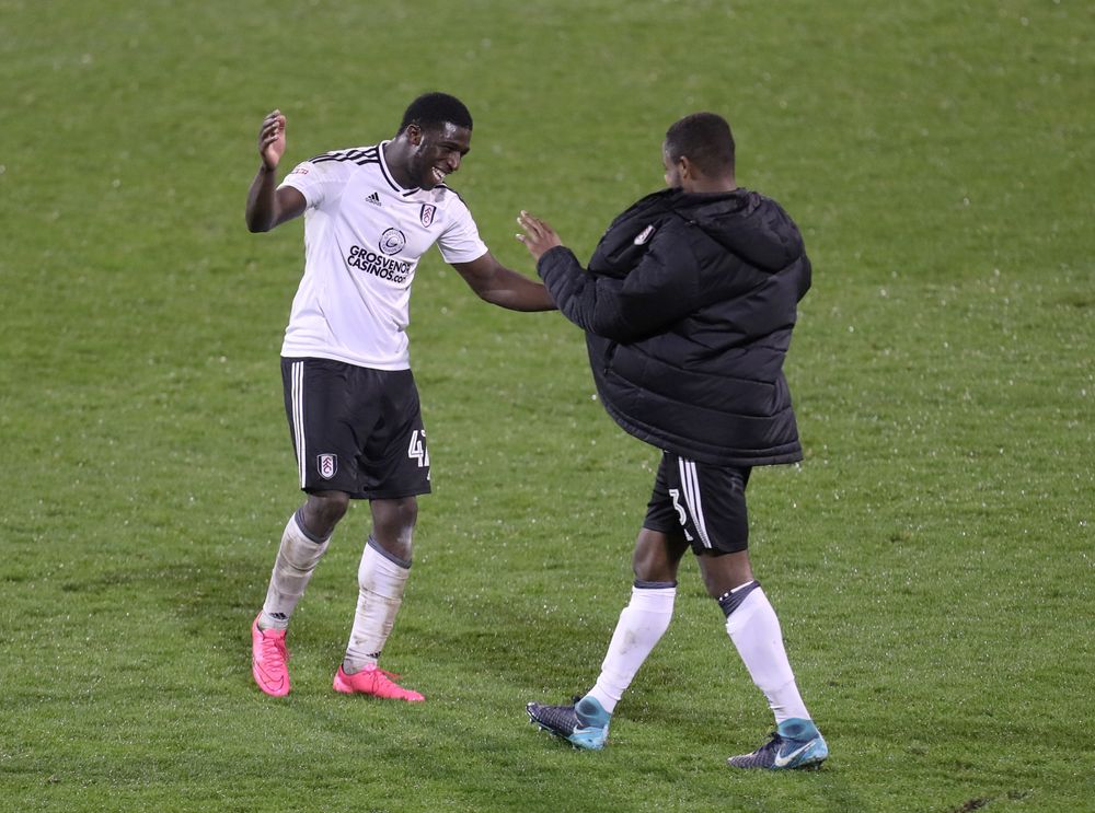 Aboubakar Kamara and Ryan Sessegnon celebrate at full-time after defeating Ipswich Town 4-1