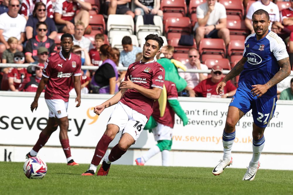 Matt Dibley-Dias passes the ball in Northampton Town's 2-1 win over Exeter City Matt Dibley-Dias passes the ball in Northampton Town's 2-1 win over Exeter City