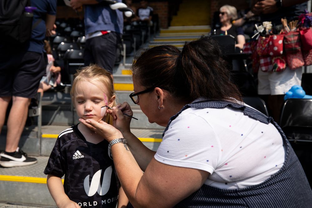 Face Painting in the Johnny Haynes Stand Face Painting in the Johnny Haynes Stand