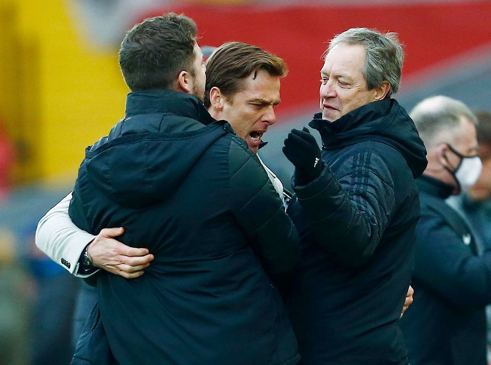 Scott Parker celebrates with his coaching staff