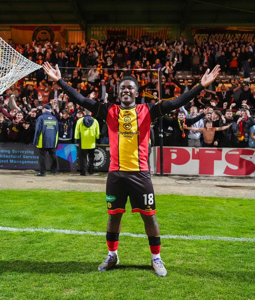 Terry Ablade celebrates with Partick Thistle supporters following his late goal against Falkirk Terry Ablade celebrates with Partick Thistle supporters following his late goal against Falkirk