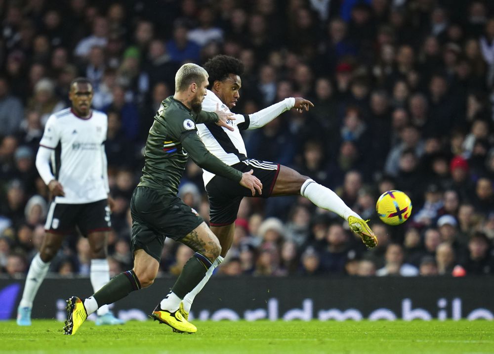 Willian pokes the ball on Willian pokes the ball on