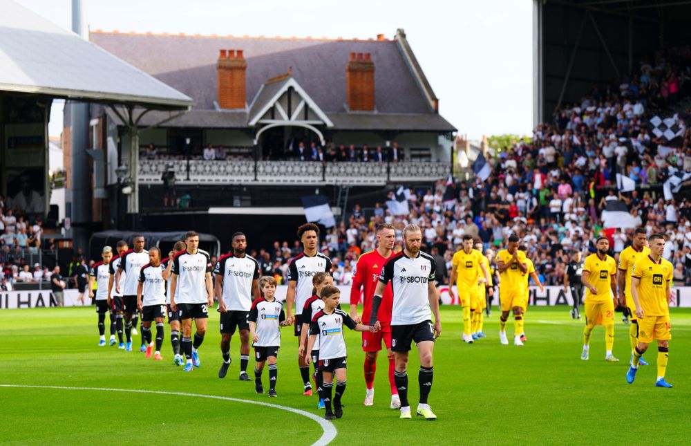 Tim Ream leads the team out ahead of his 300th Fulham appearance