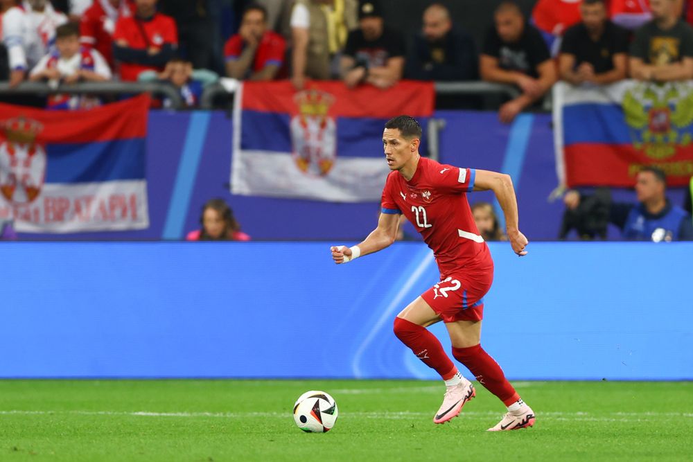 Saša Lukić' Saša Lukić' dribbling with the ball against England in Euro 2024