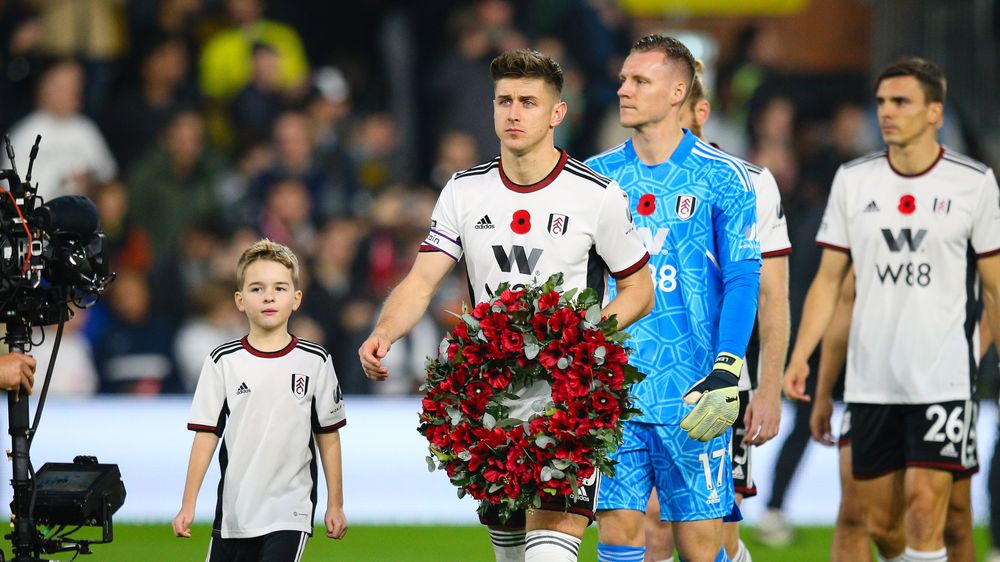 Tom Cairney leads the team out Tom Cairney leads the team out