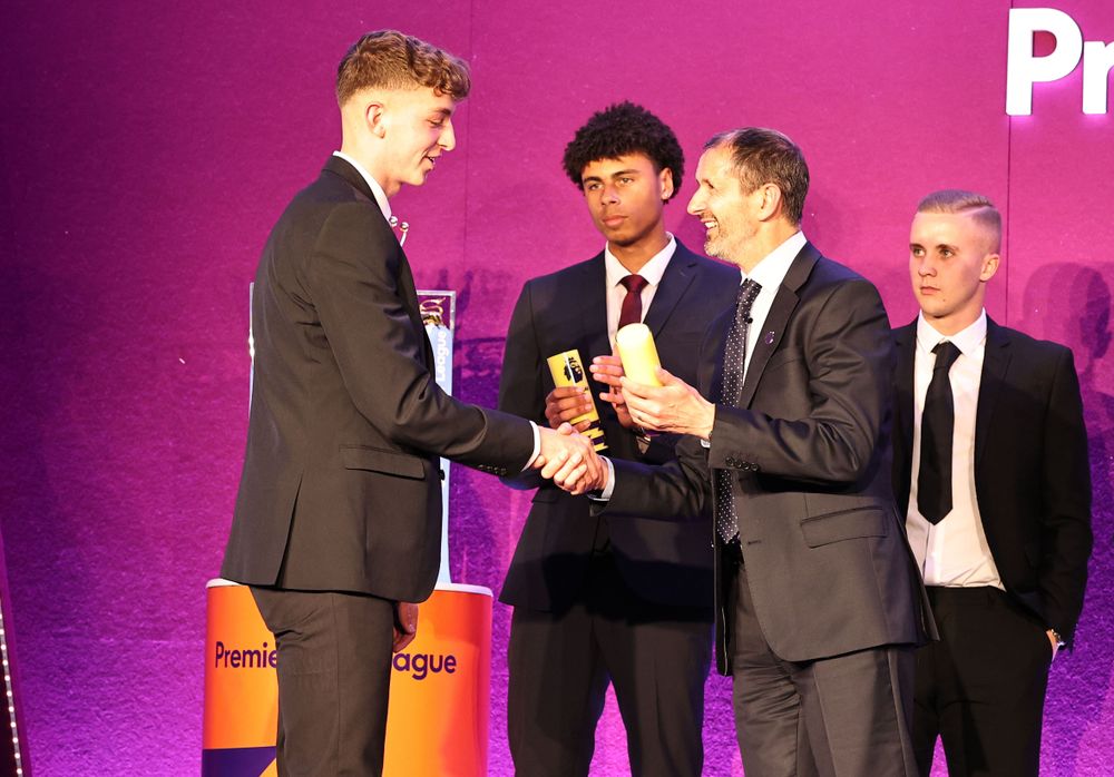 Charlie collects his 'Scholar of the Year' Award
