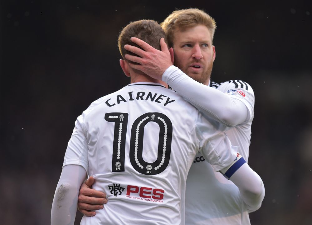 Tim Ream embraces Tom Cairney during Fulham's successful 2017/18 season Tim Ream embraces Tom Cairney during Fulham's successful 2017/18 season