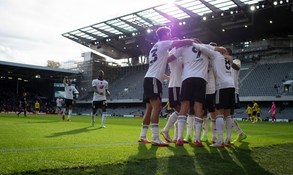 Fulham celebrate scoring against West Brom