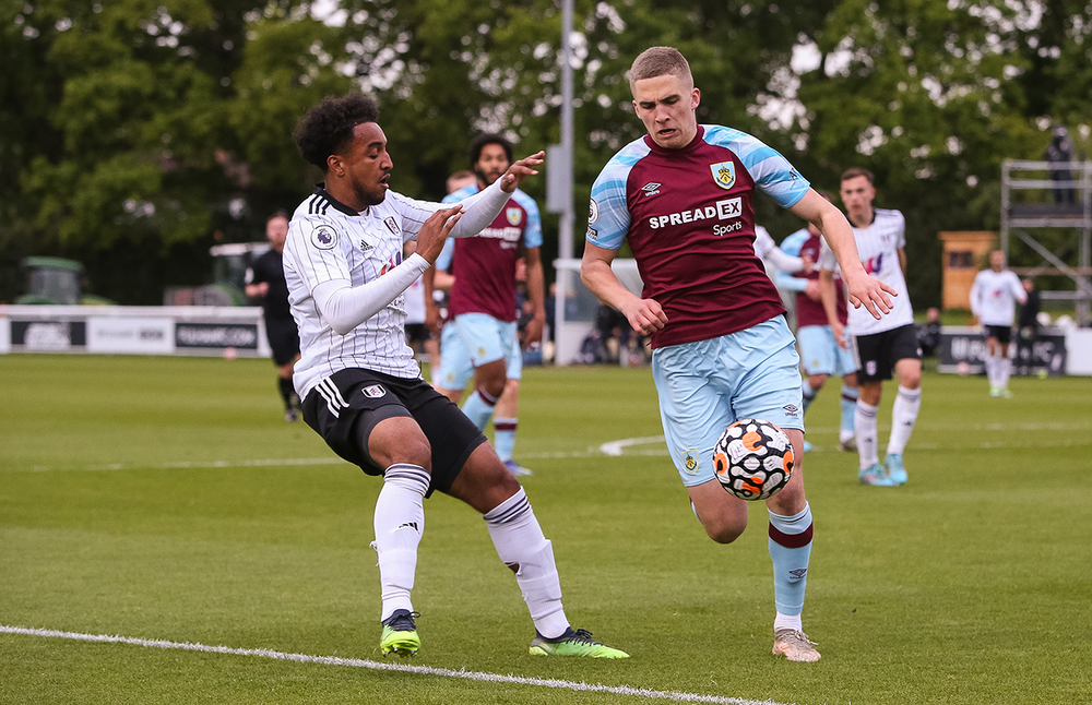 D'Auria-Henry chases a Burnley man D'Auria-Henry chases a Burnley man