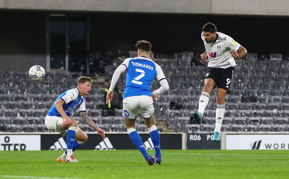 Aleksandar Mitrović heads towards goal