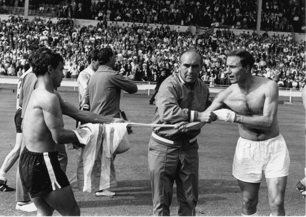 Arguably the most famous photo of George, as Alf Ramsey stops him swapping shirts with Argentina's Alberto Gonzalez