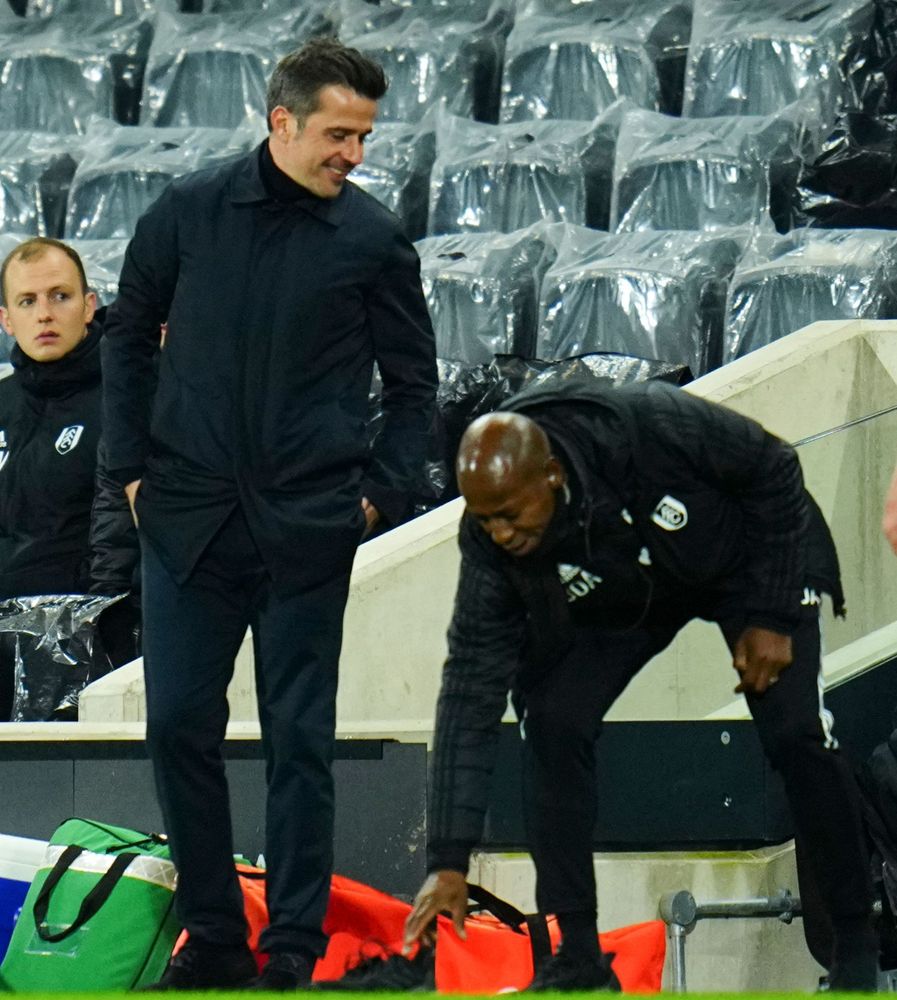 Marco Silva laughs as Luis Boa Morte loses a shoe Marco Silva laughs as Luis Boa Morte loses a shoe