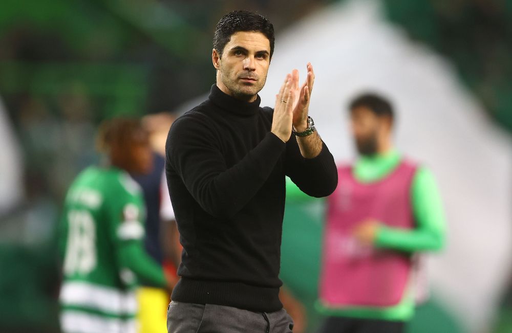 Mikel Arteta applauds the travelling Arsenal fans in Lisbon