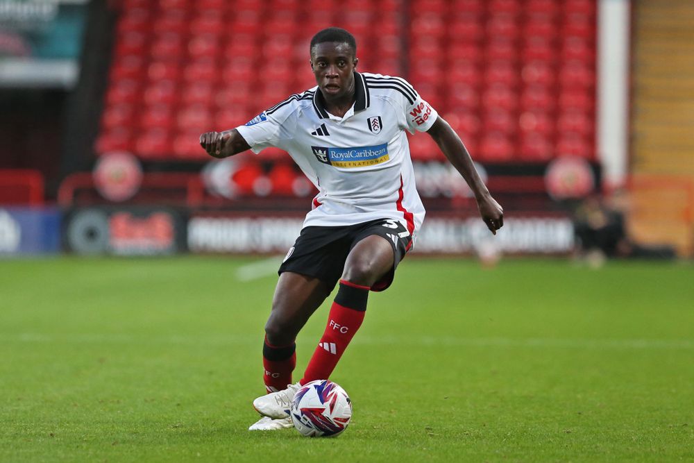 Fulham U21s defender Jon Esenga on the ball against Walsall Fulham U21s defender Jon Esenga on the ball against Walsall