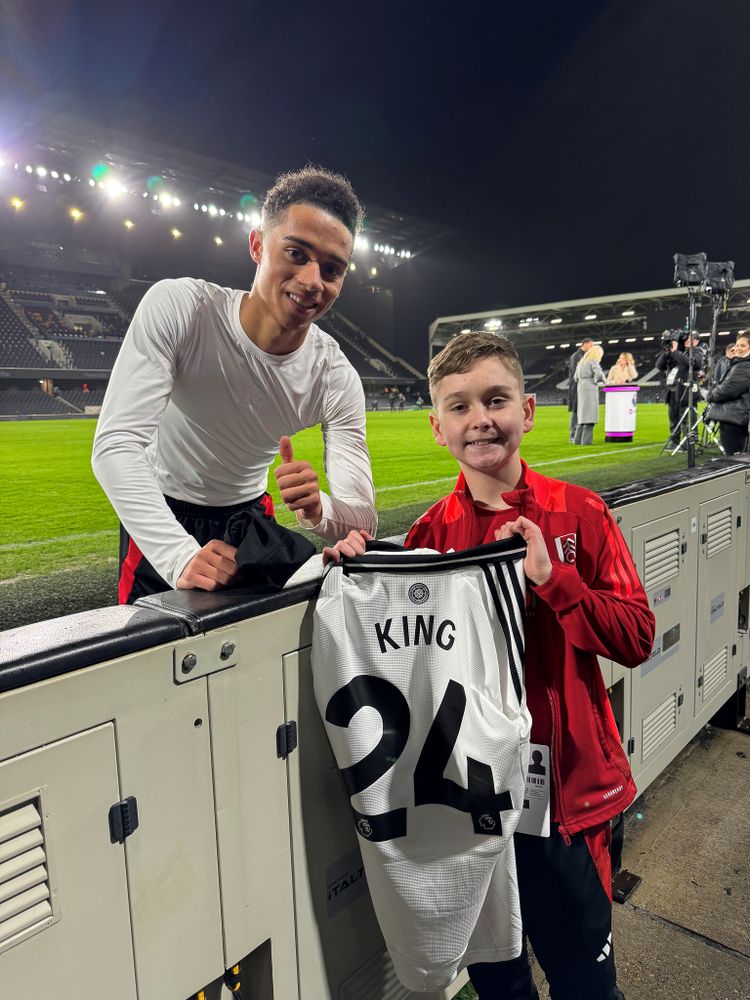 Alfie poses for a photo with Josh King Alfie poses for a photo with Josh King