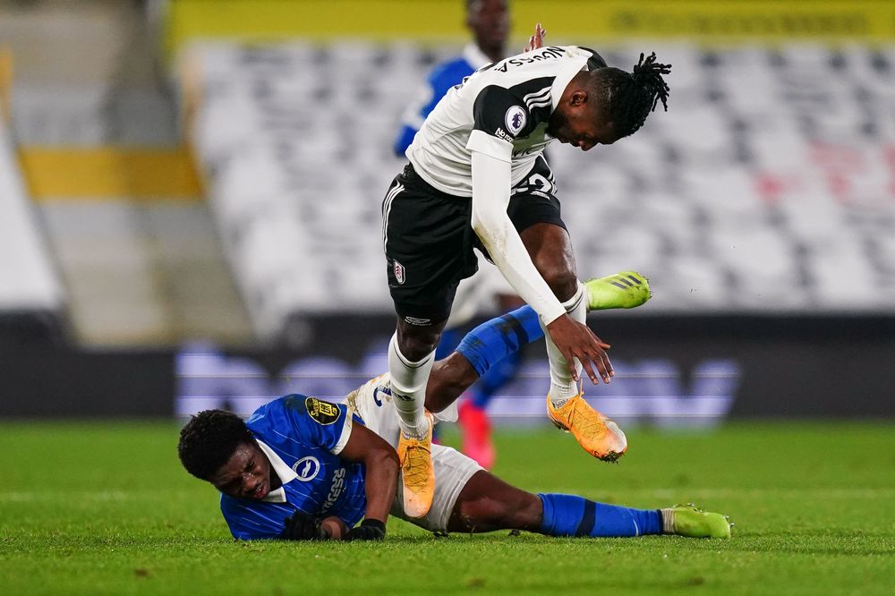 André-Frank Zambo Anguissa runs with the ball. André-Frank Zambo Anguissa runs with the ball.