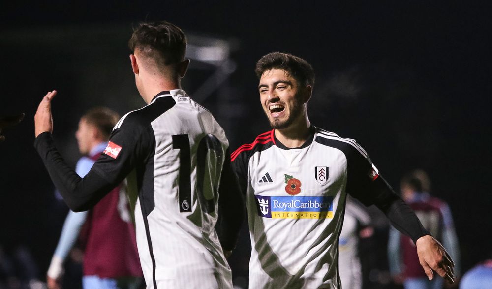 Okkas celebrates with goalscorer Okkas celebrates with goalscorer