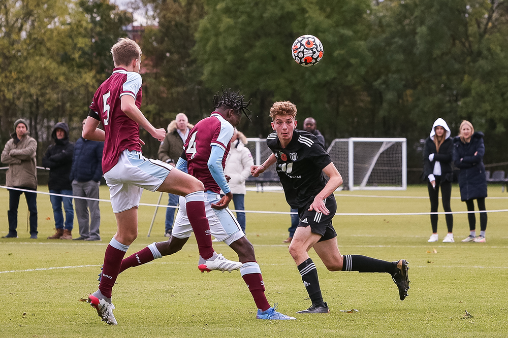 Charlie Robinson heads clear