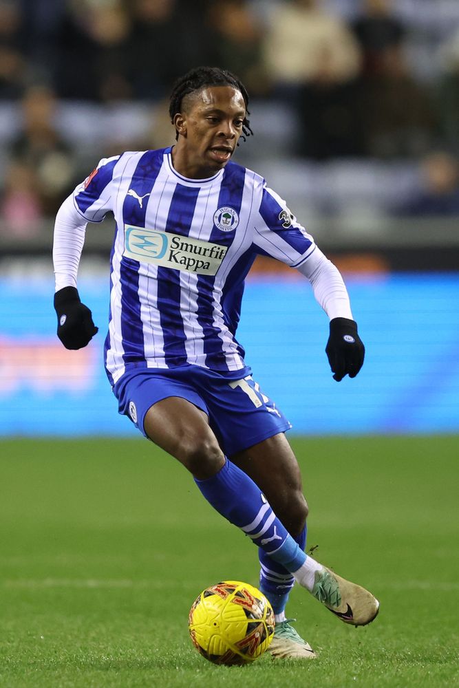 Martial Godo in action for Wigan