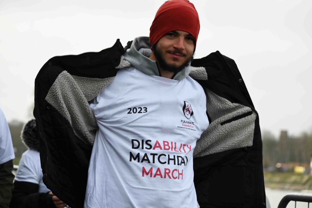 A Matchday March participant shows off his t-shirt A Matchday March participant shows off his t-shirt