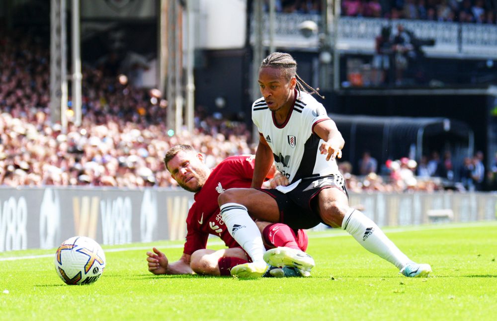 Bobby De Cordova-Reid tussles with James Milner