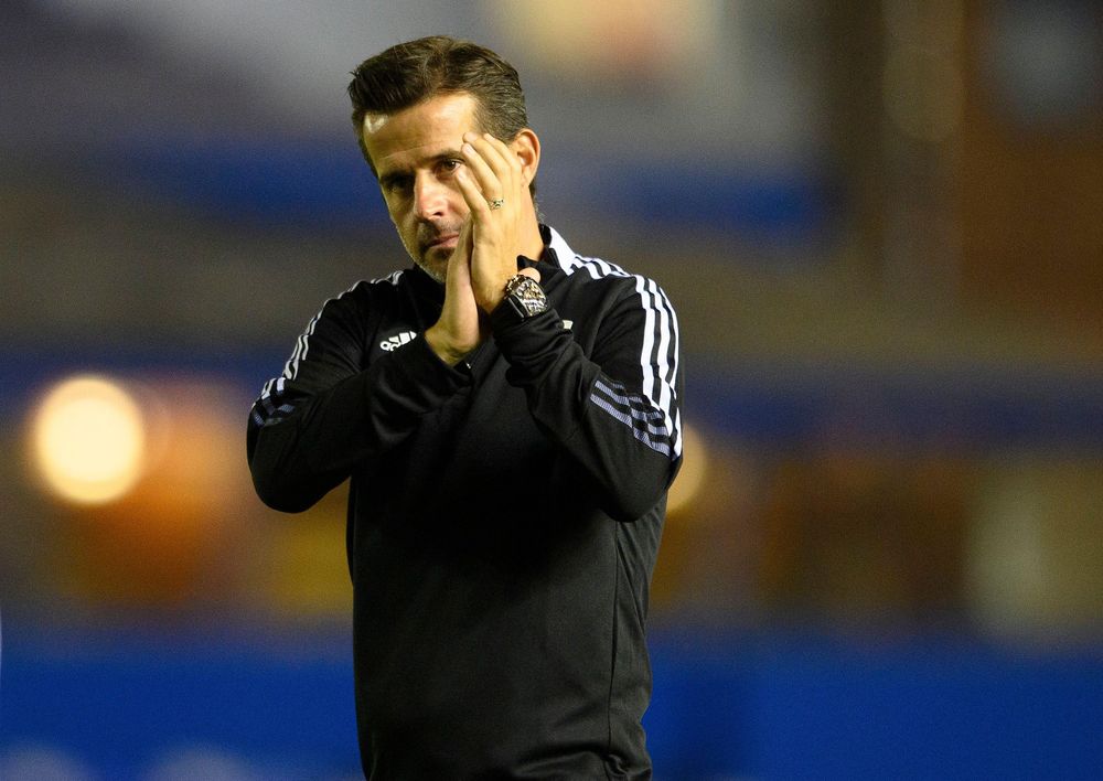 Marco Silva applauds the travelling fans after Fulham's win at Birmingham