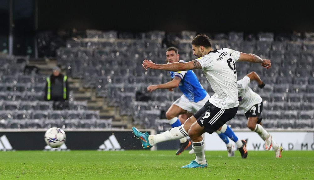 Aleksandar Mitrović slams home his penalty