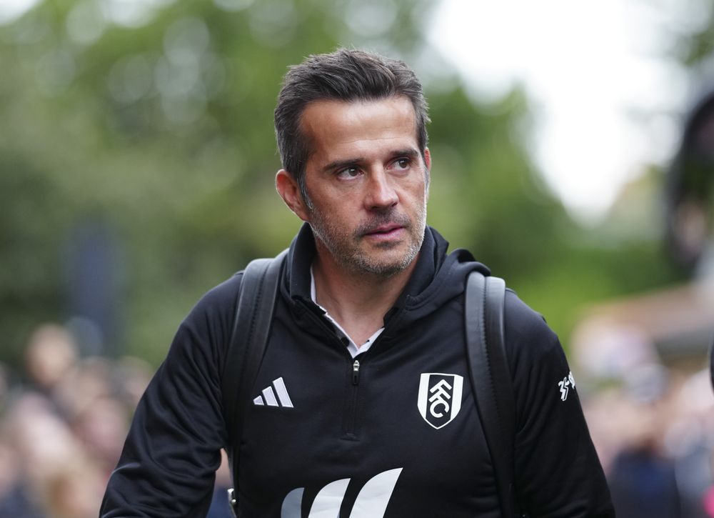 Marco Silva arrives at Craven Cottage.