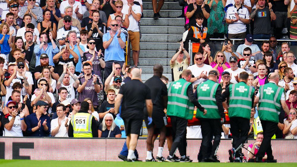 Chris Basham is stretchered off the pitch after an injury Chris Basham is stretchered off the pitch after an injury