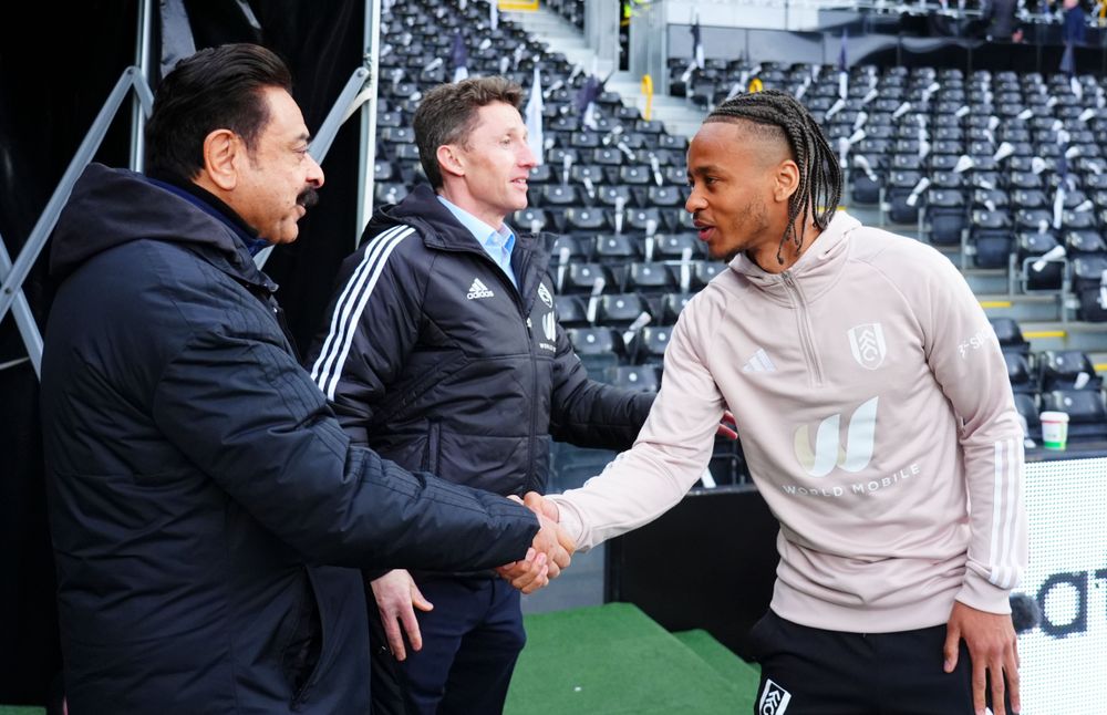 Mr Khan shakes hands with Bobby De Cordova-Reid ahead of Fulham's meeting with Liverpool in April Mr Khan shakes hands with Bobby De Cordova-Reid ahead of Fulham's meeting with Liverpool in April