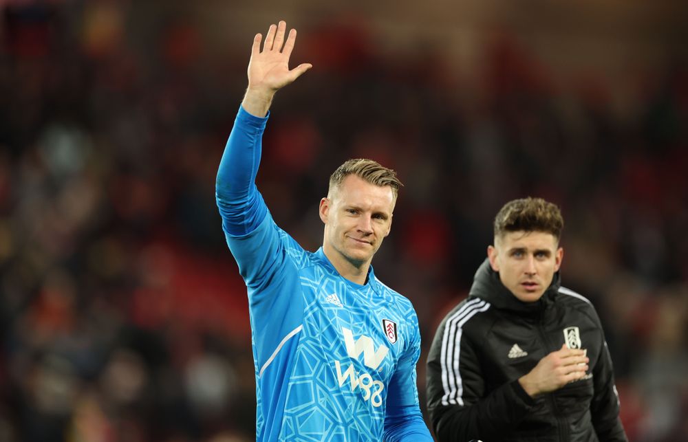 Bernd Leno acknowledges the Fulham fans at Anfield