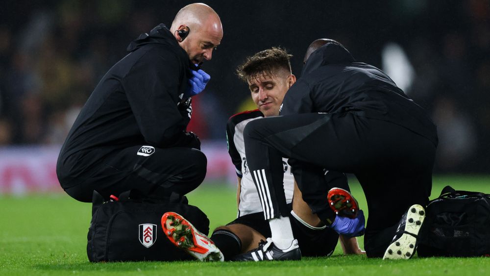 Tom Cairney receives treatment Tom Cairney receives treatment