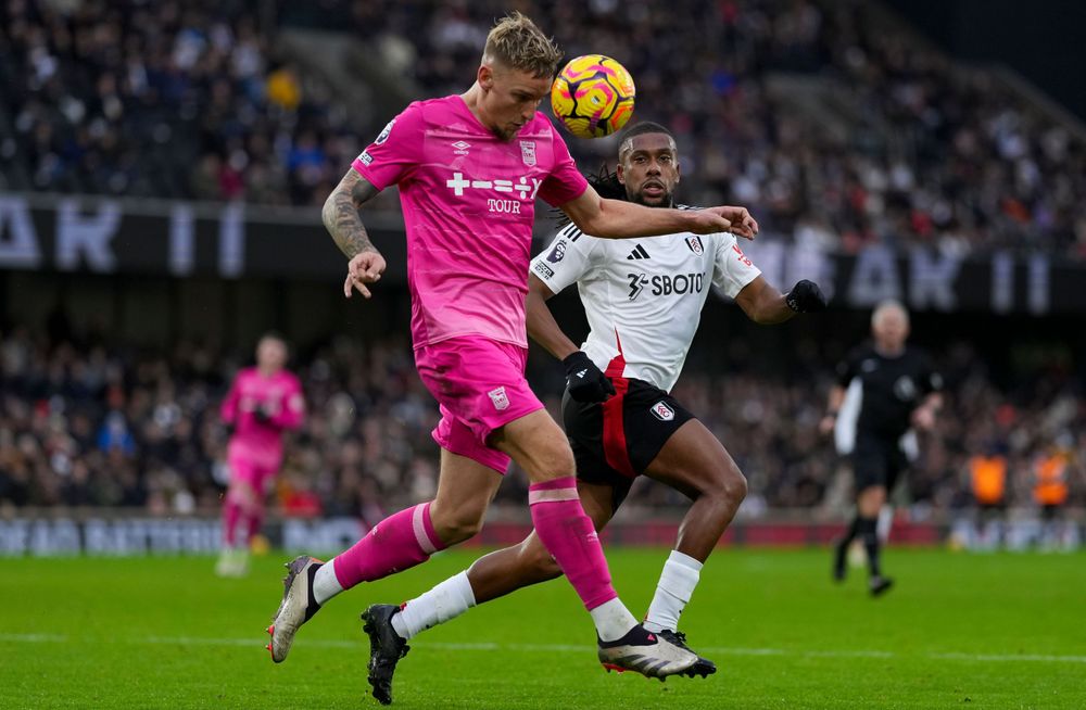 Alex Iwobi hunts down the ball against Ipswich Town Alex Iwobi hunts down the ball against Ipswich Town