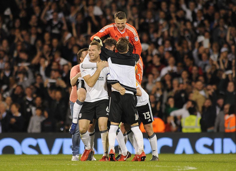 Fulham's players celebrate winning the Play-Off Final