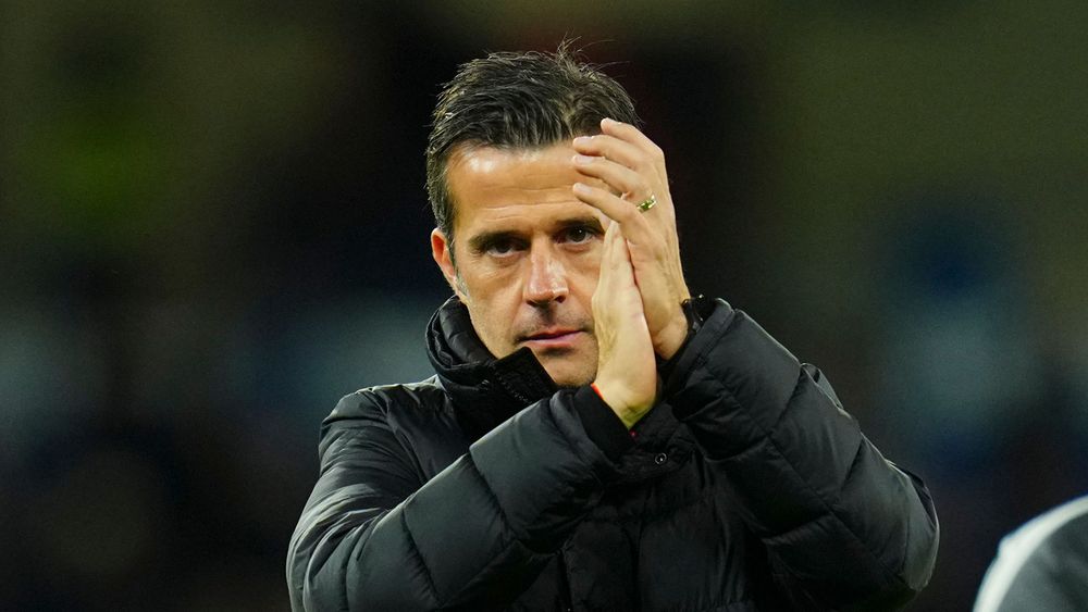 Marco Silva applauds the away support