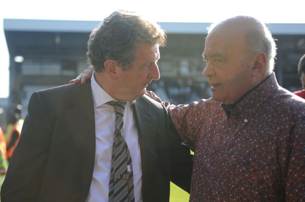 Roy Hodgson and Mohamed Al Fayed celebrate after Fulham secure seventh place