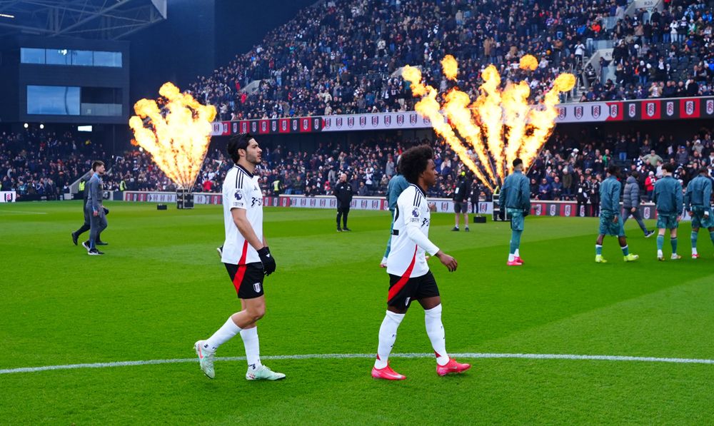 Raúl Jiménez and Willian walk out at the Cottage Raúl Jiménez and Willian walk out at the Cottage