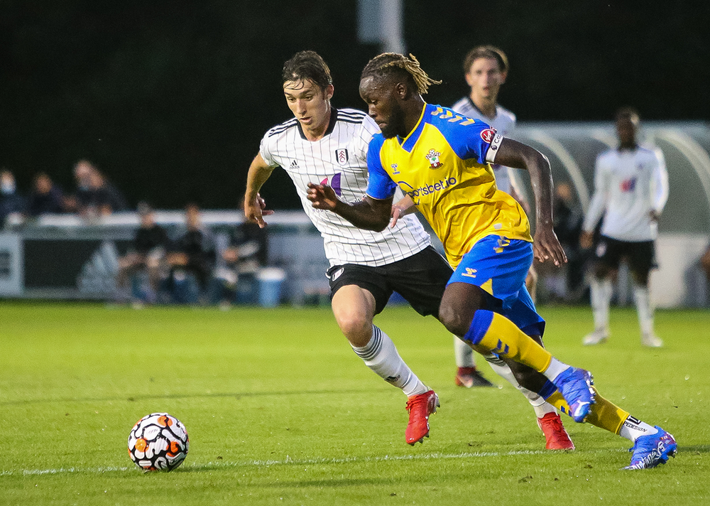 Kieron Bowie takes on a defender Kieron Bowie takes on a defender