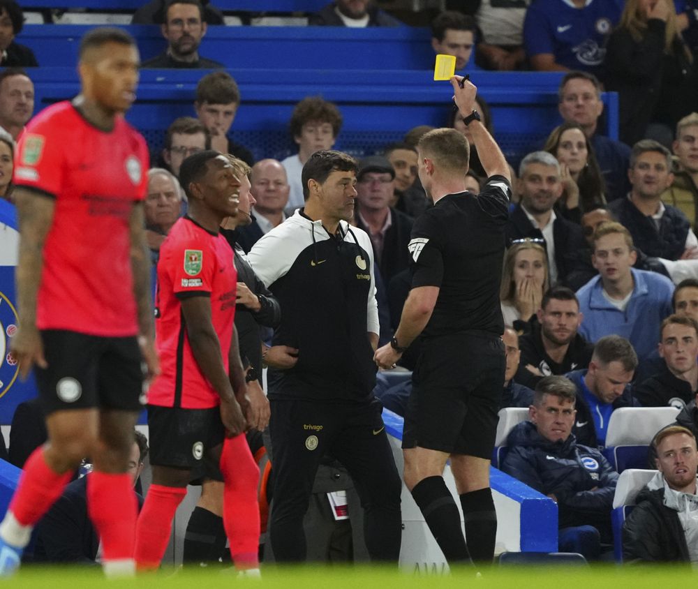 Mauricio Pochettino is booked against Brighton Mauricio Pochettino is booked against Brighton