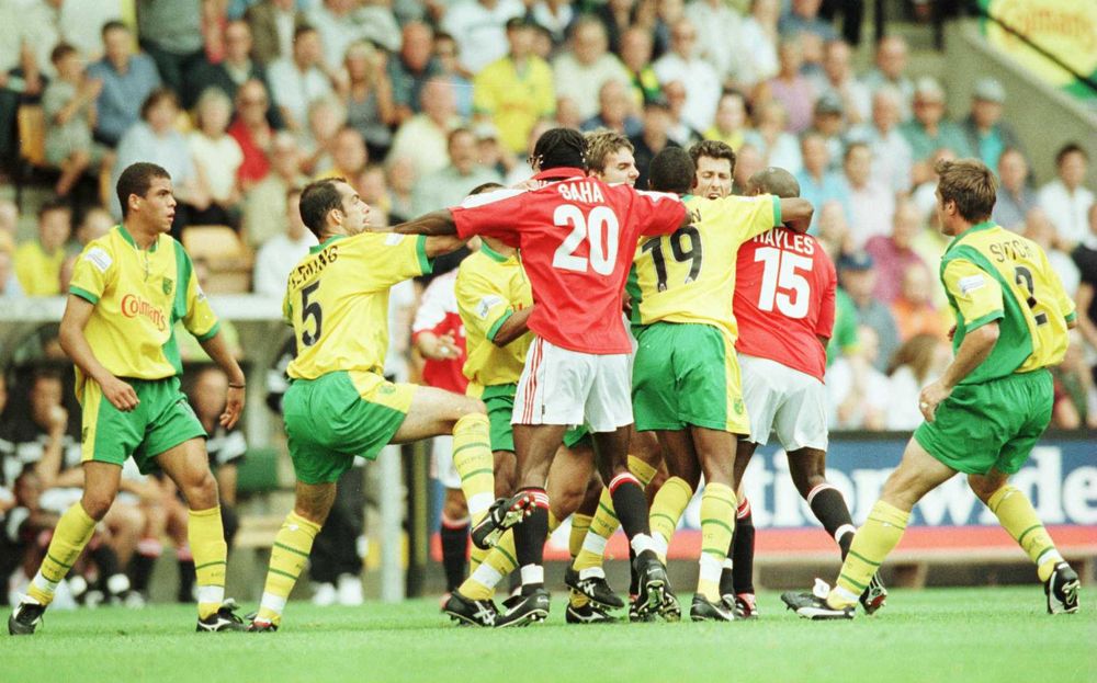 The Fulham and Norwich players clash at Carrow Road The Fulham and Norwich players clash at Carrow Road