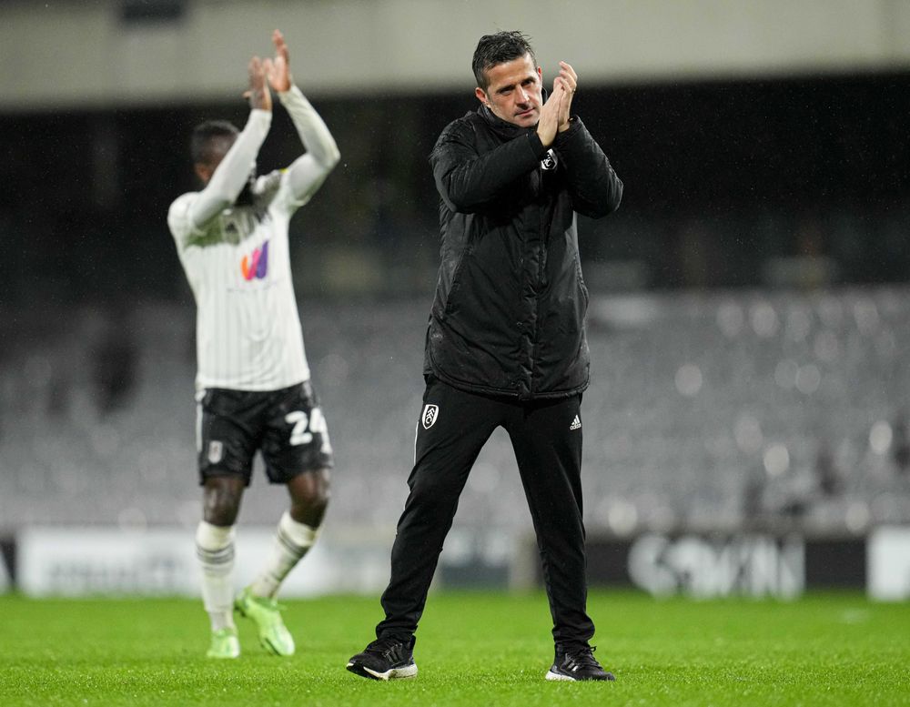 Marco Silva celebrates with the fans at full-time Marco Silva celebrates with the fans at full-time