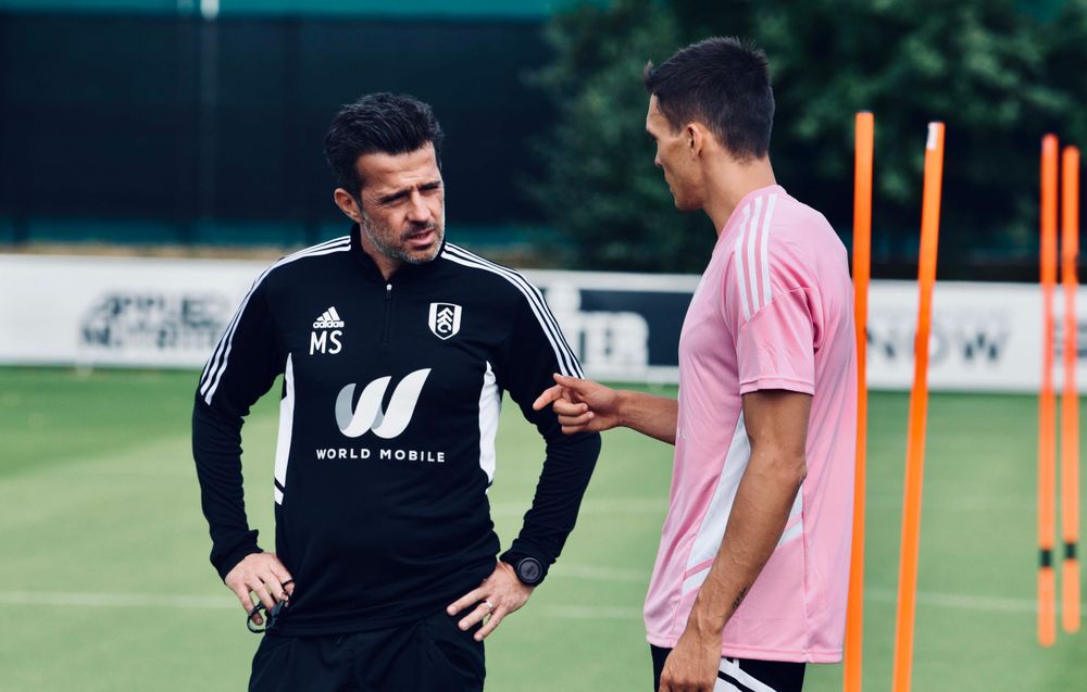 João Palhinha chats with Marco Silva during training