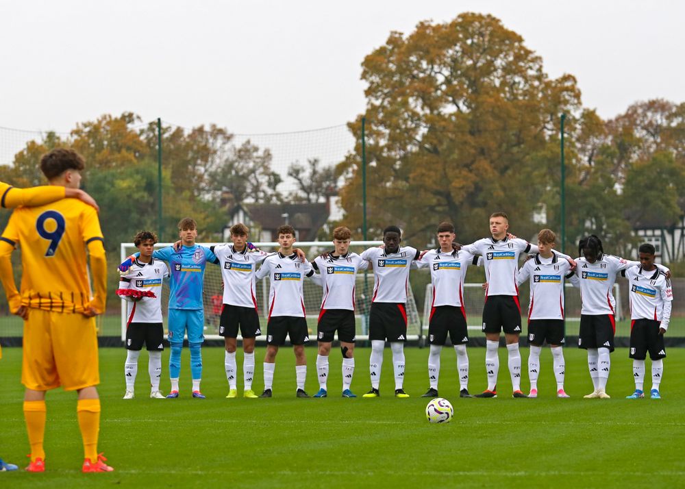 Fulham U18s players observe a minute's silence before their game against Brighton U18s Fulham U18s players observe a minute's silence before their game against Brighton U18s