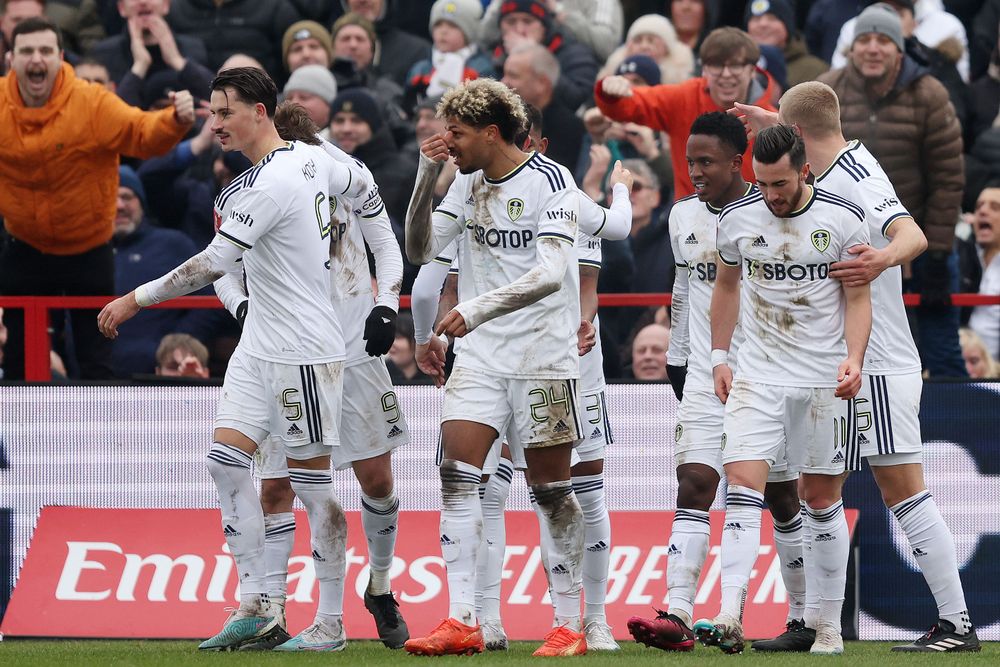 Leeds players celebrate scoring against Accrington