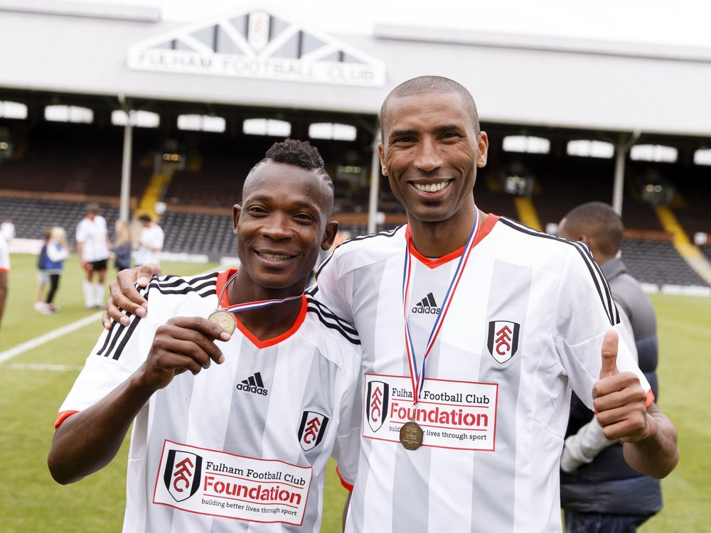 Abdes Ouaddou with John Paintsil following a charity match at Craven Cottage